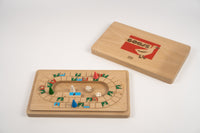 Wooden board game with pieces and dice on a white background