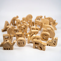 Wooden alphabet letters on a white background
