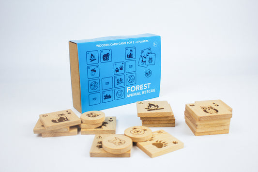 Complete set of Forest Animal Rescue wooden board game – eco-conscious playset by Pure Play with engraved animal tiles and minimalist box.