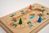 Board game with dice and cones on a wooden board