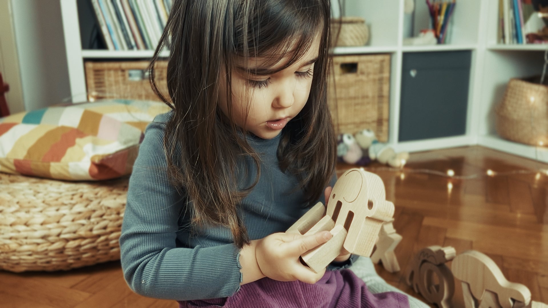 Ad. 27 seconds. Directed by Alexandru Belc, edited by Patricia Chelaru. Cast -Miriam Belc. Shot on iPhone. Child playing with matching wooden animals and letters. 