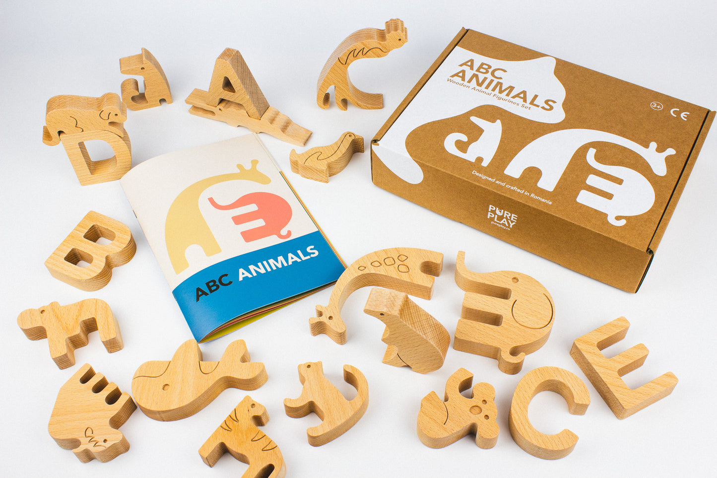 Cardboard box. Montessori Wooden Alphabet Puzzle Set with Animal Figurines. Made in Romania.